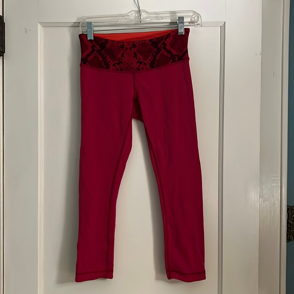 Lululemon snake skin and pink legging